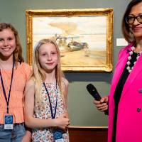 Jennifer Moss, WGVU, interviewing two student stewards